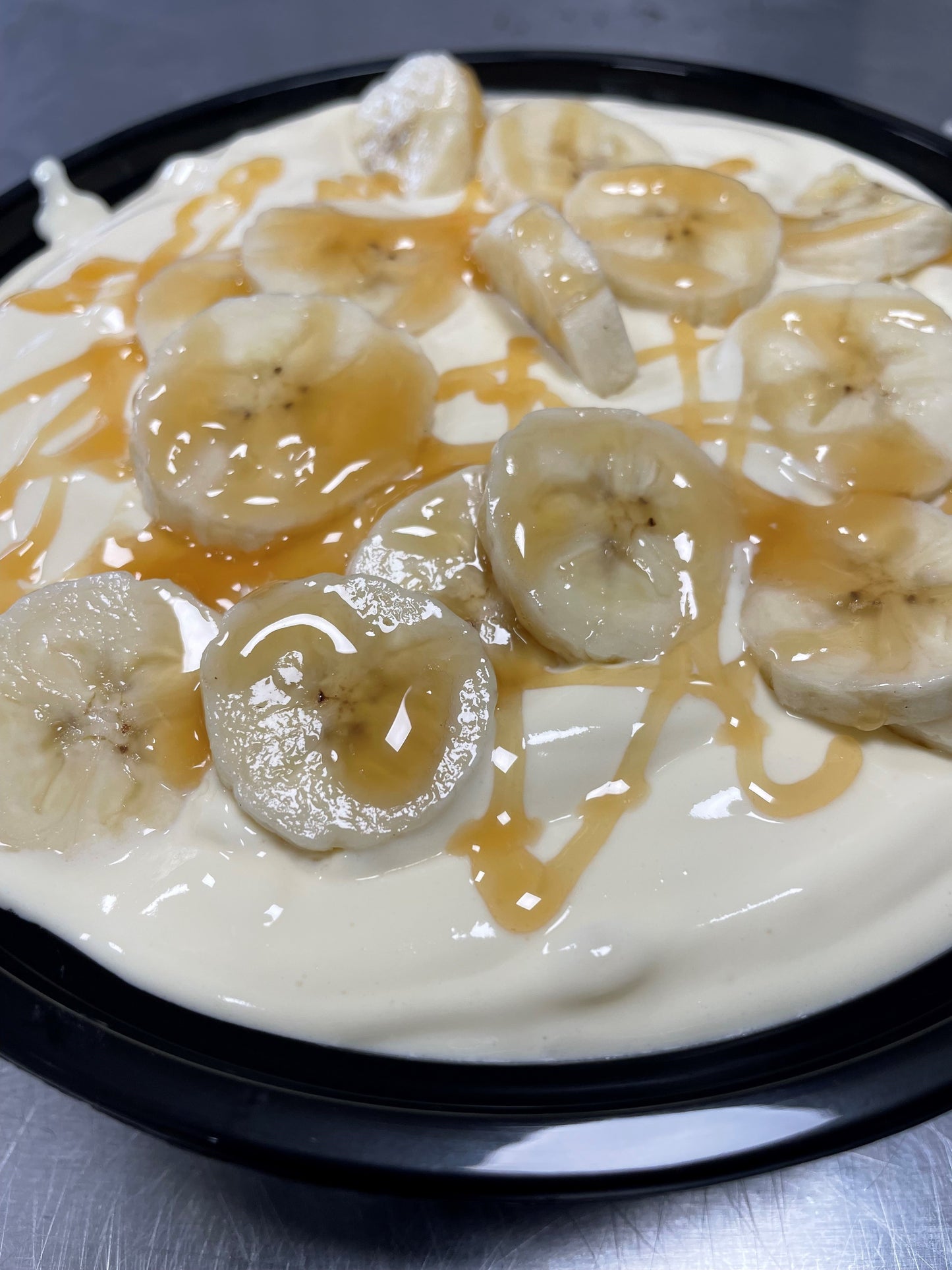 Scratch made banana pudding with fresh banana's and a caramel twist