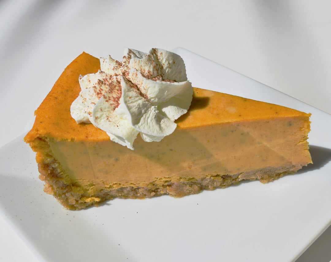 Classic pumpkin pie with whipped cream - traditional Thanksgiving dessert
