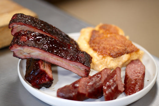 BBQ Catered plate with pork spare ribs, spicy polish and WIsco Mac n Cheese