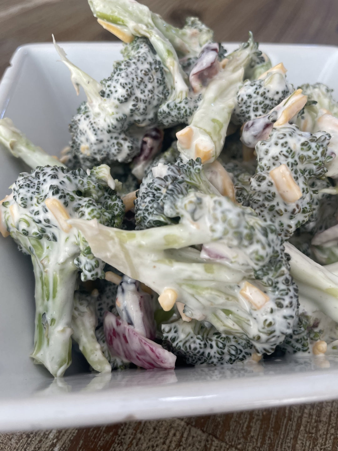 Fresh broccoli salad with red onion and cranberries 